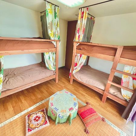 Guest House Waraemon Nago Exterior photo
